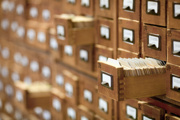 database concept. vintage cabinet. library card or file catalog.