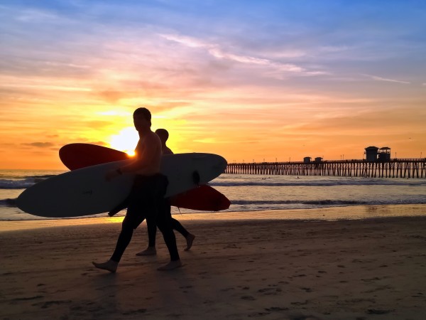 Surfers Sunset Oceanside Pier Beach San Diego California USA