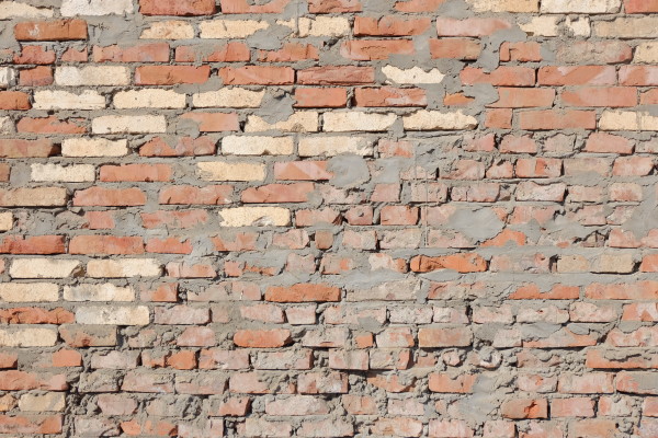 Red obsolete brick wall background