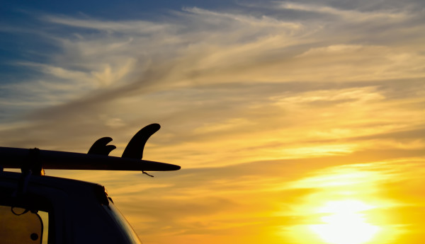 surfboard fins at sunset