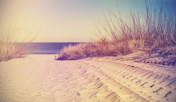 Vintage filtered beach, nature background or banner.