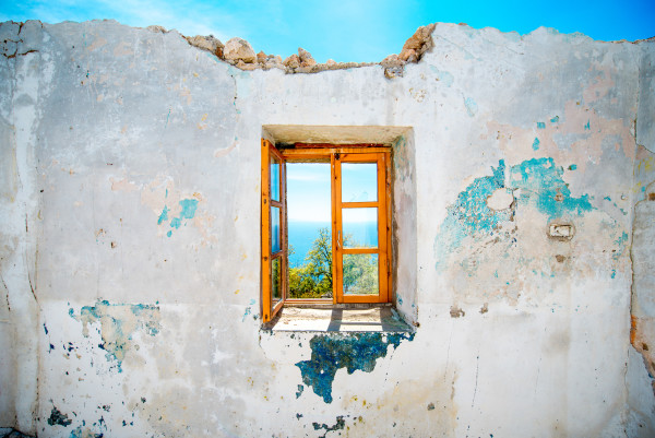 Old window in abandoned house