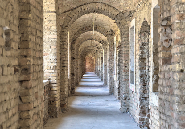 Castle tunnel with a series of arches in the ruined Bastion fortress in the Slovak city of Komarno.