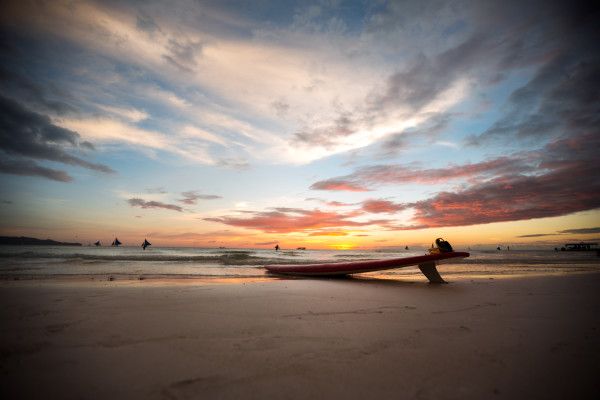 surfboard on a deserted beach