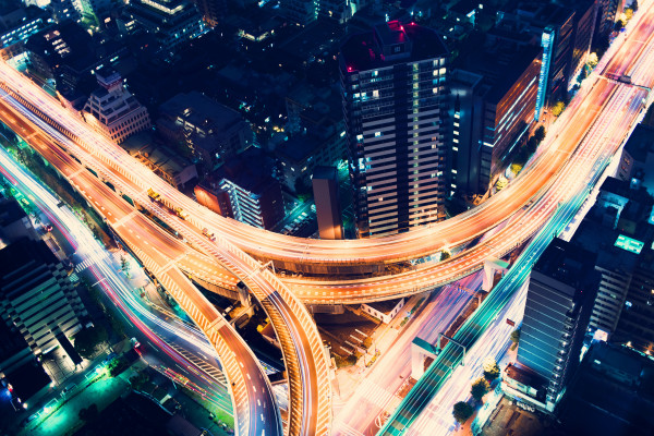 Aerial-view highway junction at night in Tokyo, Japan