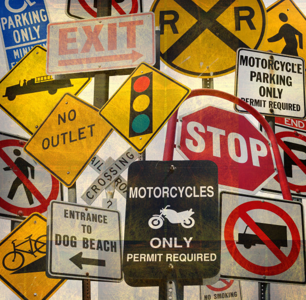 aged and worn collection of street sign