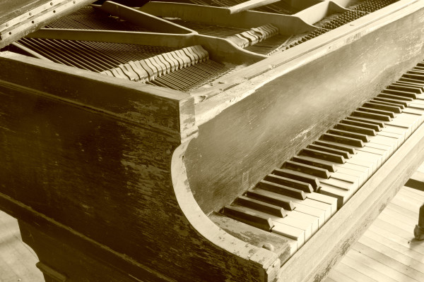 Wooden piano in sepia