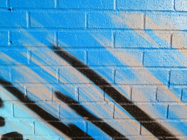 Painted Wall: Colorful Abstract Pattern in Detail of Graffiti