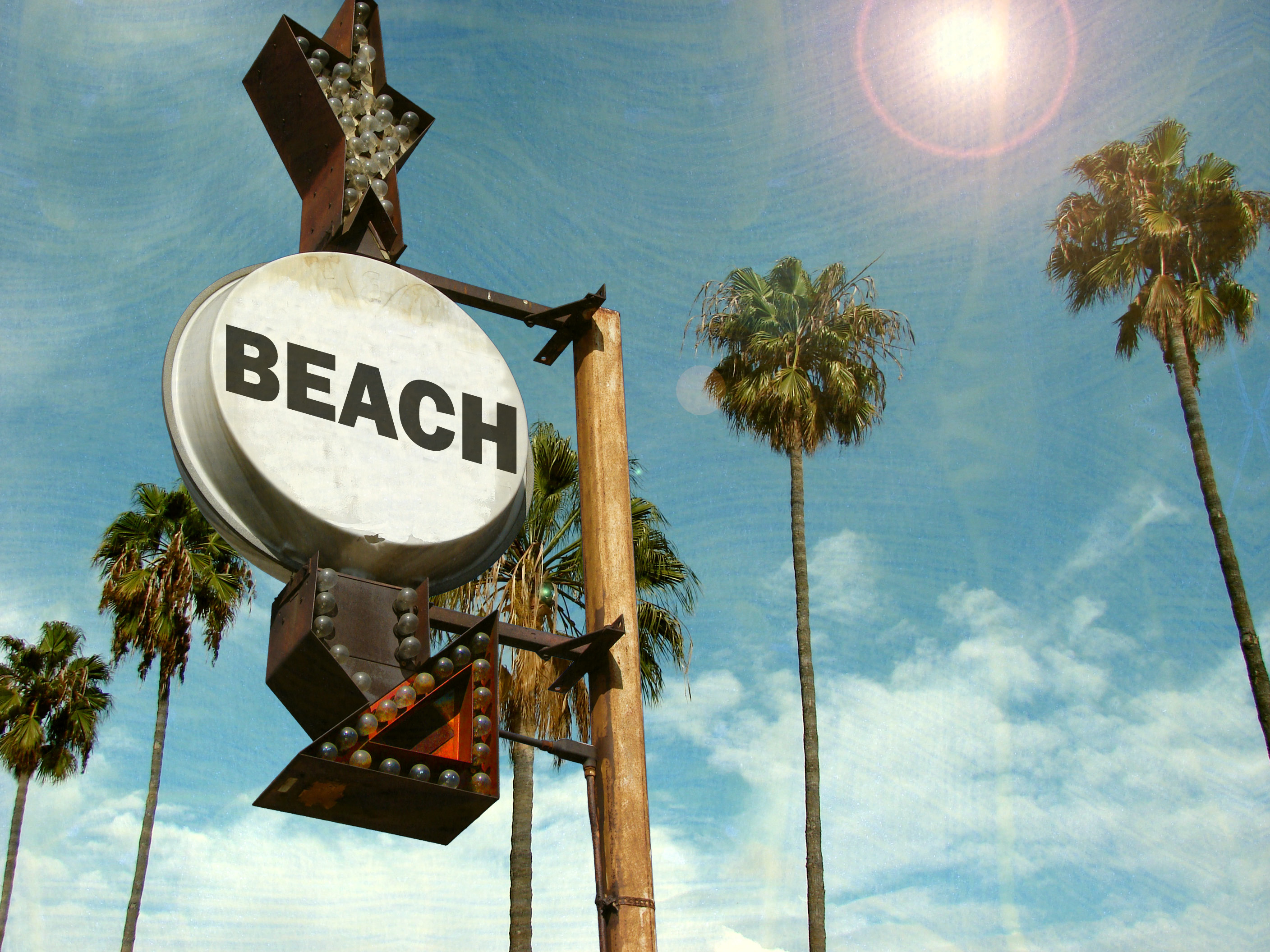 aged and worn vintage photo of beach sign with palm trees - Custom