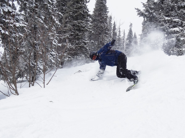 Snowboarder  on a mountain slope