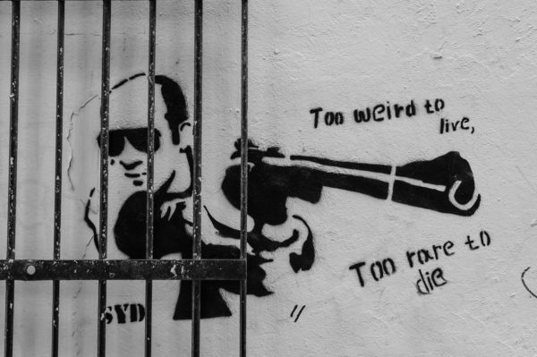 Man with gun – Street art in London